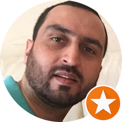 A passenger smiling joyfully on a dhow cruise, depicted in a testimonial image